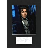 Paul McGann signature piece mounted below colour photo from Dr Who. Approx. overall size 16x12.