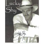 Lucky Shy signed 10x8 b/w photo. Good Condition. All signed items come with our certificate of