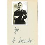 Henrich Himmler signed page with small b/w photo in uniform affixed. Good Condition. All signed