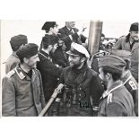 Gunter Prien WW2 top Uboat ace signed 7 x 5 b/w photo on the bridge with his crew. Good Condition.