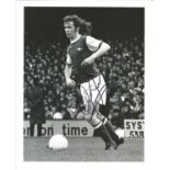Liam Brady Signed Arsenal Football 8x10 Photo. Good Condition. All signed items come with our