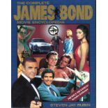 Film and TV James Bond Encyclopaedia paperback book c/w 15 signatures from various Bond movies.