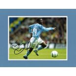 Shaun Wright-Phillips signed colour Man City photo. Mounted to approx. overall size 13x10.5. Good