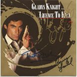 Timothy Dalton, Carry Lowell and Gladys Knight signed 45rpm record sleeve of Licence to Kill. Record