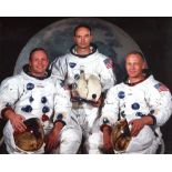 APOLLO 11. Set of TWO 8x10 photographs, one of the crew of Apollo 11