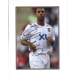 Anton Ferdinand signed colour West Ham photo. Mounted to approx. size 13x10.5. Good Condition. All