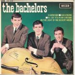 The Bachelors signed 45rpm record sleeve of Charmaine. Record included. Good Condition. All signed