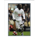 Pascal Chimbonda signed colour Spurs photo. Mounted to approx. size 13x10.5. Good Condition. All