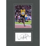 Athletics Usain Bolt 14x10 overall signature piece c/w 7x5 colour photo and album page signature