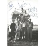 Madness Ska Band Fully Signed Vintage 7x10 Music Photo. Good Condition. All signed items come with
