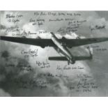 World War Two 6x8 multi signed b w photo of a Lancaster in flight signed by 20 Bomber command