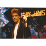 Huey Lewis signed 12x8 colour photo. American singer, songwriter, and actor. Good Condition. We