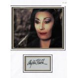 Anjelica Huston signed autograph presentation. High quality professionally mounted 15x13 inch