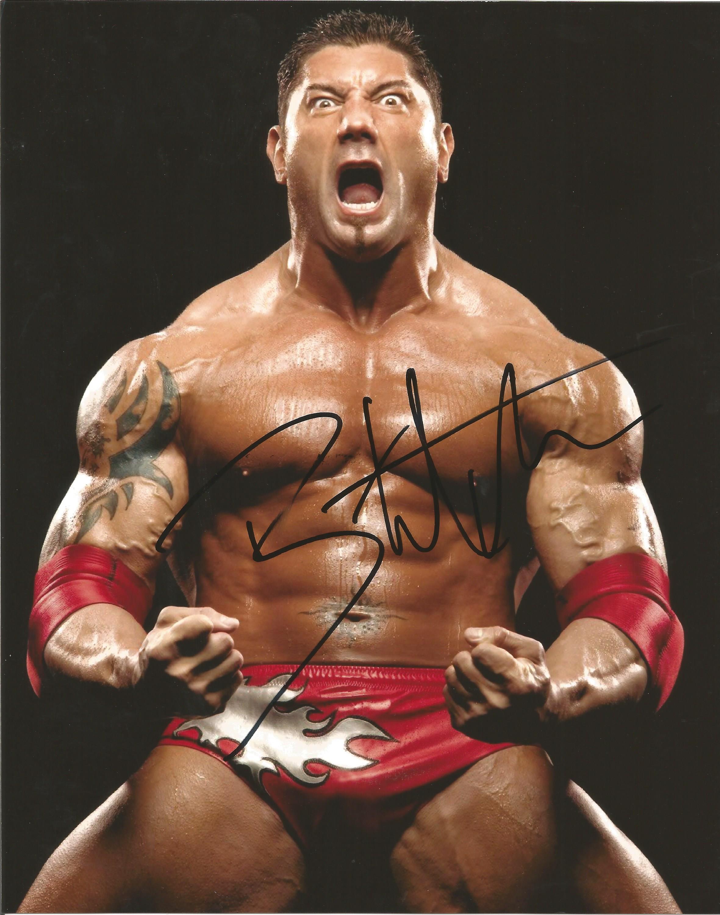 Batista signed 10 x 8 colour WWE Wrestler Portrait Photo, from in person collection autographed at