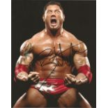 Batista signed 10 x 8 colour WWE Wrestler Portrait Photo, from in person collection autographed at
