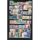 World stamp collection in red stockbook 20 pages of stamps from around the world including USA and