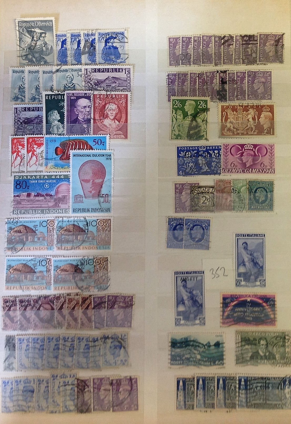 World High value stamp collection in green stock book. Includes stamps from Australia, Germany,