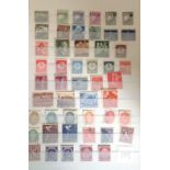 Stamp collection in red stock book. Combination of mint and used stamps. Several countries including