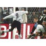 Emile Heskey signed 12x8 colour photo. English former professional footballer who played as a