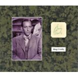 Bing Crosby signature piece mounted alongside b/w photo. Approx. overall size 12x10. Good Condition.