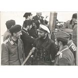 Gunter Prien WW2 top Uboat ace signed 7 x 5 b/w photo on the bridge with his crew. Good Condition.