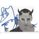 Boy George Singer Signed Promo Photo. Good Condition. All signed pieces come with a Certificate of