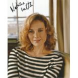 Natasha Little Actress Signed 8x10 Photo. Good Condition. All signed pieces come with a