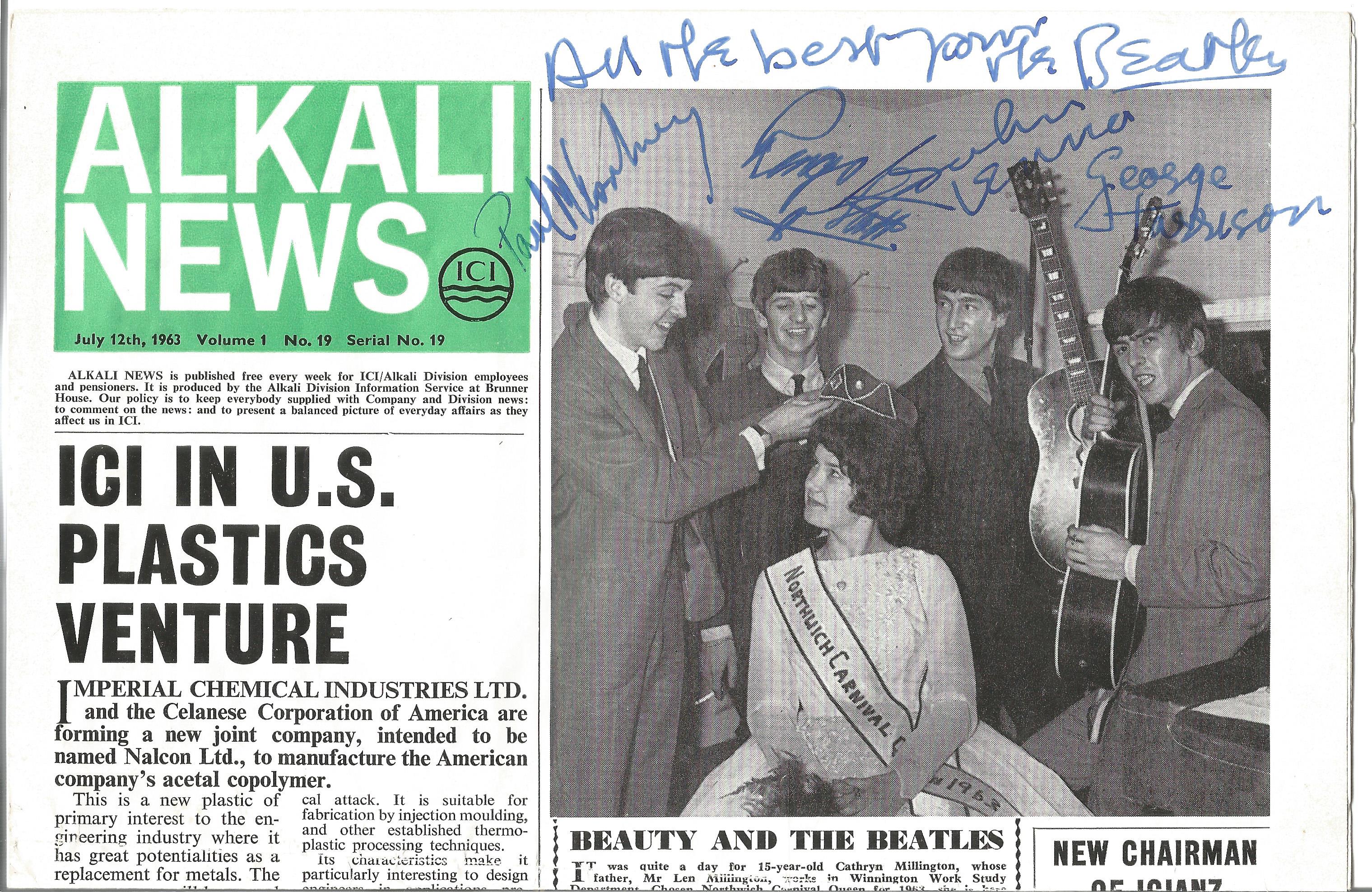 John Lennon signed for the Beatles newspaper picture of the band. Lennon has signed himself and also