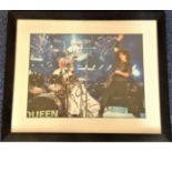 Brian May & Roger Taylor signed colour Queen photo. Framed and mounted to approx 22x18.