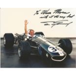 Dan Gurney signed 10x8 colour photo, former Motoracing driver. Good Condition. All signed pieces