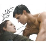 Kristen Stewart and Robert Pattinson signed 10x8 colour Twilight photo. Good Condition. All signed