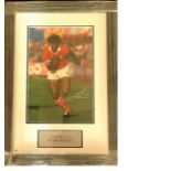 Ruud Gullit signed colour football photo. Mounted and framed to approx size 20x14. Good Condition.