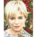 Sienna Miller signed 10x8 colour photo. Good Condition. All signed pieces come with a Certificate of