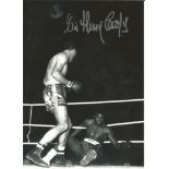 Sir Henry Cooper signed 7x5 b/w photo. Good Condition. All signed pieces come with a Certificate