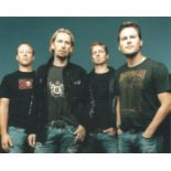 Nickleback signed 10x8 colour photo. Signed by 1. Good Condition. All signed pieces come with a