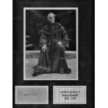 Boris Karloff signature piece mounted and framed below b/w photo with a silver plaque alongside.