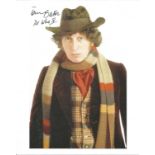 Tom Baker signed 10x8 colour photo as Dr Who. He has added Dr Who IV to his signature. Good