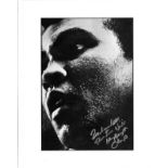 Muhammad Ali signed photo. Mounted to approx size 16x12. Good Condition. All signed pieces come with