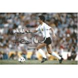 Ossie Ardiles Signed Argentina Photo. Good Condition. All signed pieces come with a Certificate of