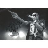 Tinchy Stryder signed 12x8 b/w photo. Ghanaian-British rapper, singer, entrepreneur and investor.