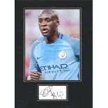 Ya ya Toure signature piece below colour Manchester City photo. Mounted to approx. size 16x12.