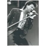Paul Young signed 12x8 b/w photo. English singer, songwriter and musician. Formerly the frontman