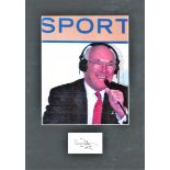 Murray Walker signature piece mounted below colour photo of the famous Formula 1 motor racing