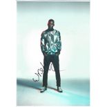 Wretch 32 signed 12x8 colour photo. English hip hop artist. Good Condition. All signed pieces come