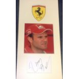 Rubens Barrichello Formula One racing driver, signature piece mounted below colour photo of the