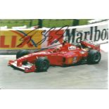 Michael Schumacher signed 6x4 colour photo. Good Condition. All signed pieces come with a