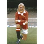 Denis Law signed 12x8 colour photo. Good Condition. All signed pieces come with a Certificate of