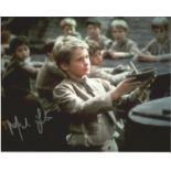 Mark Lester as Oliver signed classic Can I have More colour 10 x 8 photo. Good Condition. All signed