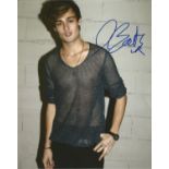 Douglas Booth signed 10x8 colour photo. English actor. He first came to public attention following