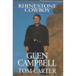 Glen Campbell signed hardback book Rhinestone Cowboy signed to inside page. Good Condition. All